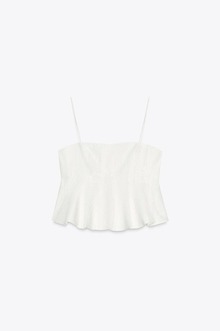 Conjunto de falda capa y top con godets bordados