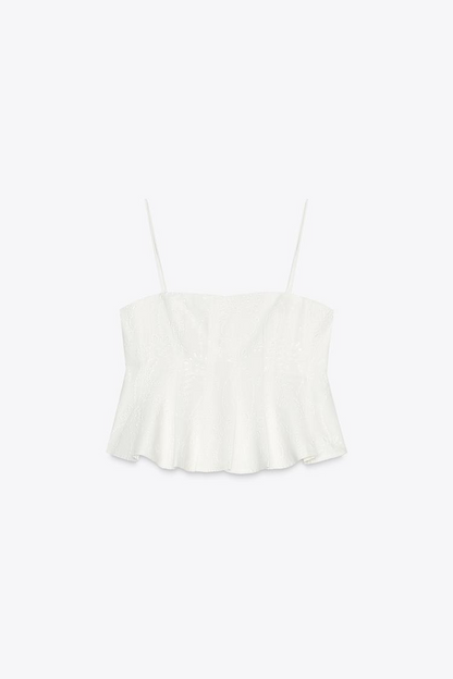 Conjunto de falda capa y top con godets bordados